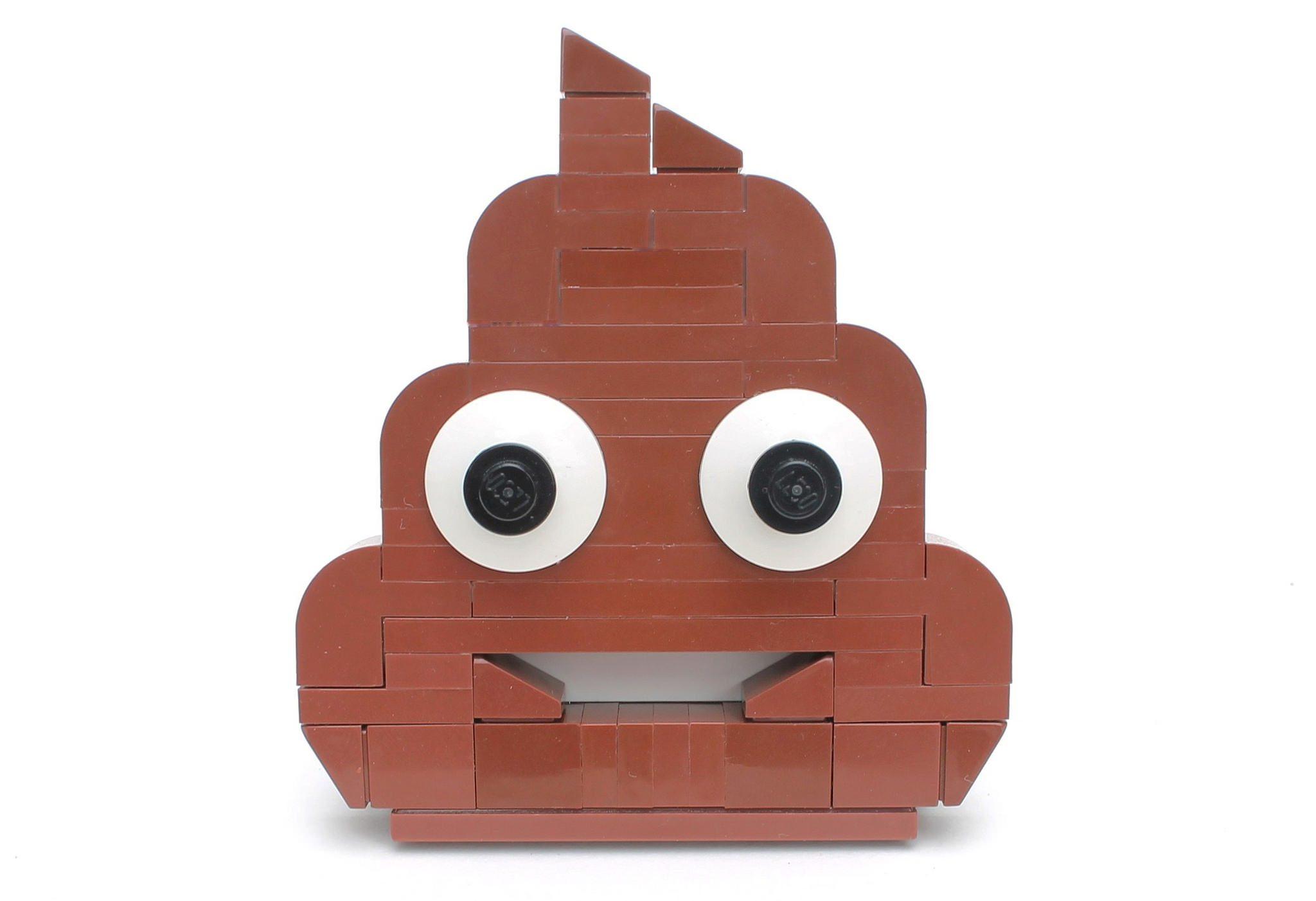 A smiling poop emoji made of Lego
