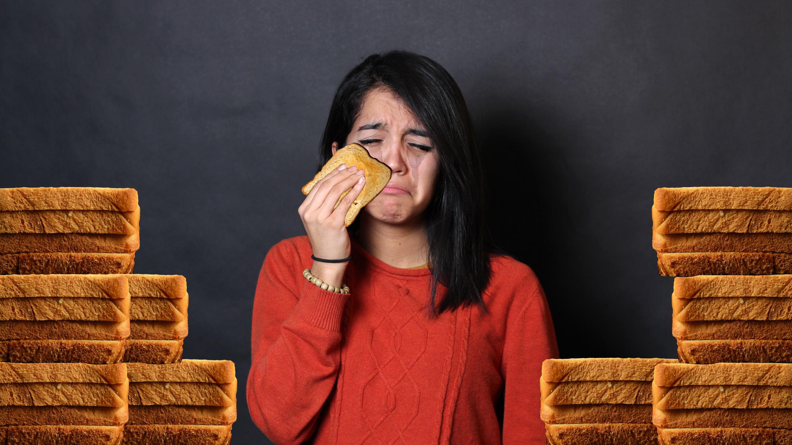 A sad girl and her sad, sad bread. PHOTO ILLUSTRATION: CHRIS BLANCHETTE