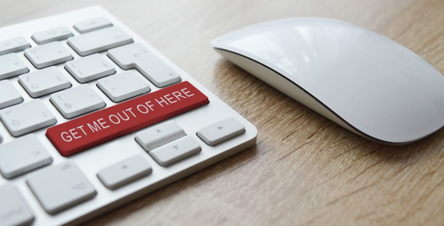A mouse and a keyboard with the words "Get me out of here" on it