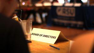 Title card on table with "Board of Directors" written on it