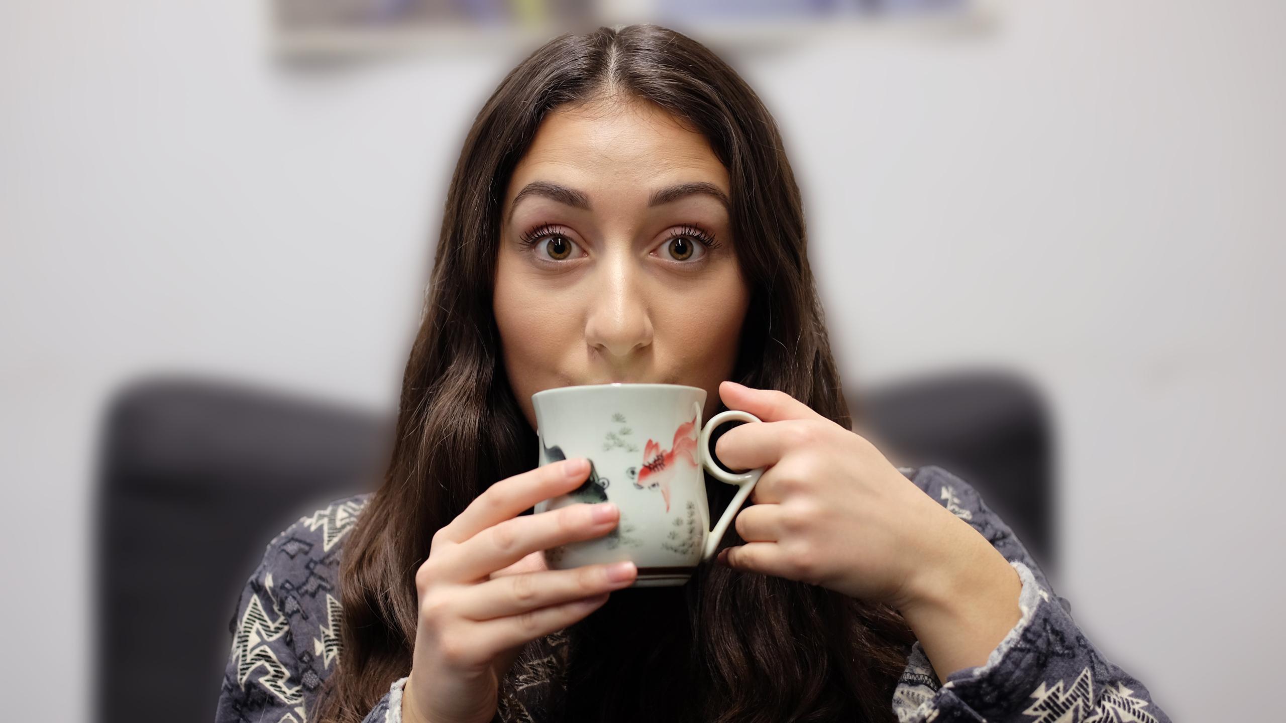 Woman drinking coffee from a mug