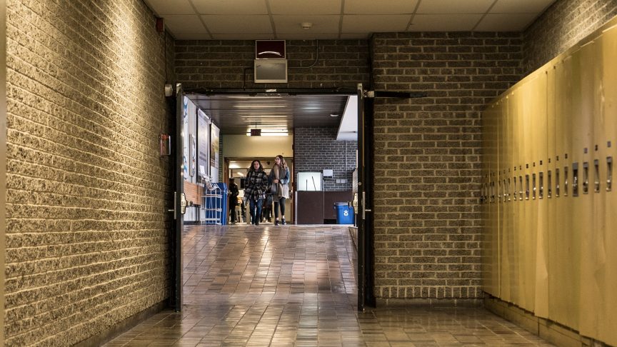 Students walk inside Kerr Hall