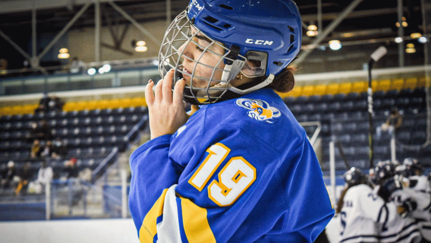 A Rams women's hockey player shows frustration after a goal