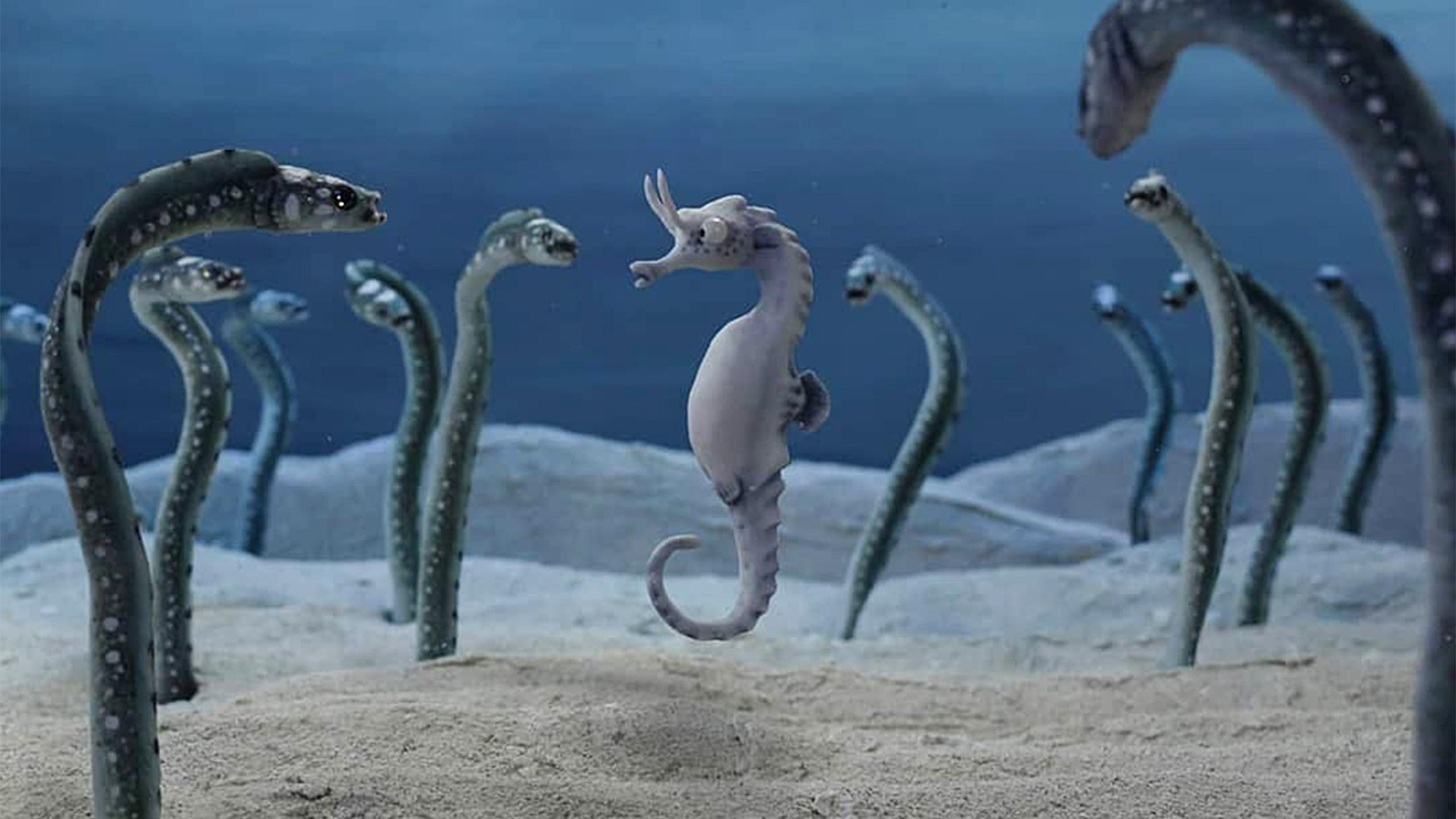 An animated seahorse surrounded by scary eels