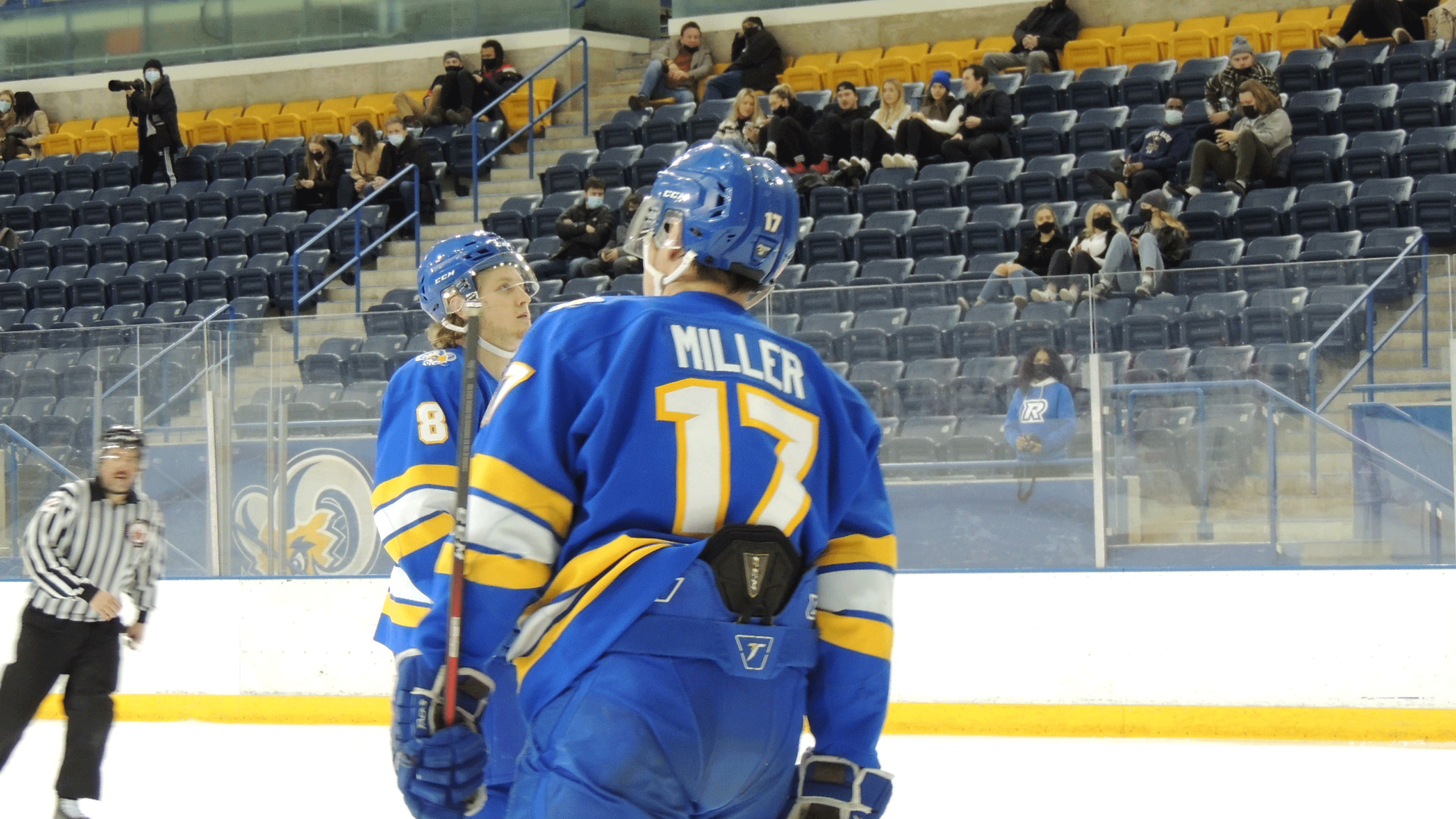 A Rams men's hockey player with the jersey number 17 skates down the ice