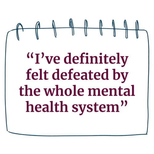 A notepad paper that says "I've definitely felt defeated by the whole mental health system"