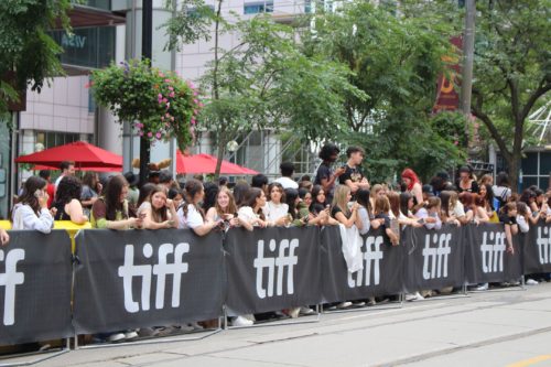 Fans waiting for Harry Styles at the premiere of My Policeman.