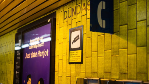 Security Sign on the wall of Dundas Station