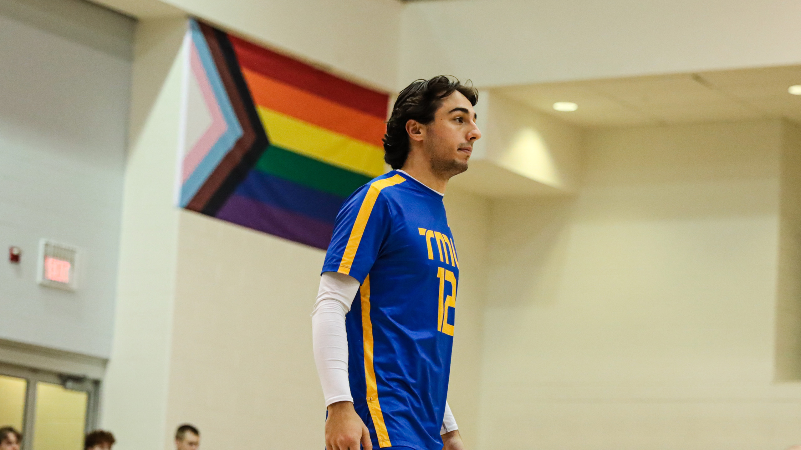 TMU men's volleyball player Tony Tanouchev stands on the court