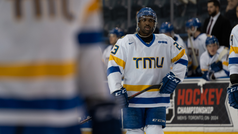TMU Bold men's hockey player Elijah Roberts skates on the ice