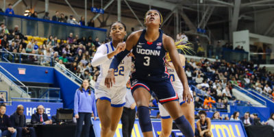 UConn Huskies player Aaliyah Edwards boxes TMU women;s basketball player Lauren Meek