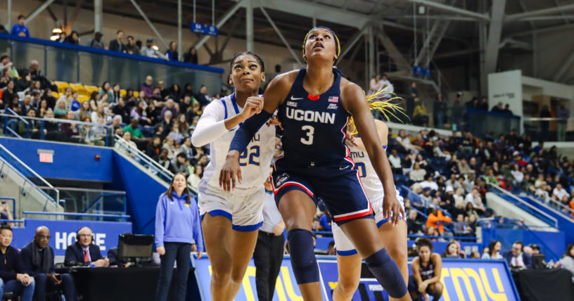 UConn Huskies player Aaliyah Edwards boxes TMU women;s basketball player Lauren Meek