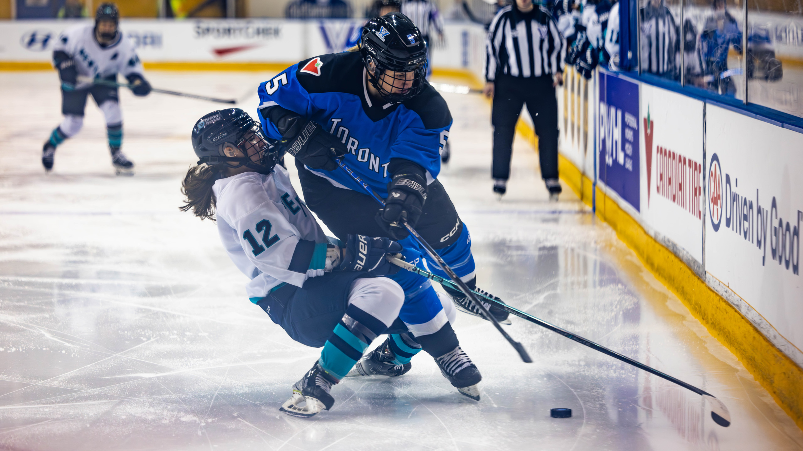 New York player Chloe Aurard collides into the shoulder of Toronto PWHL player Lauriane Rougeau