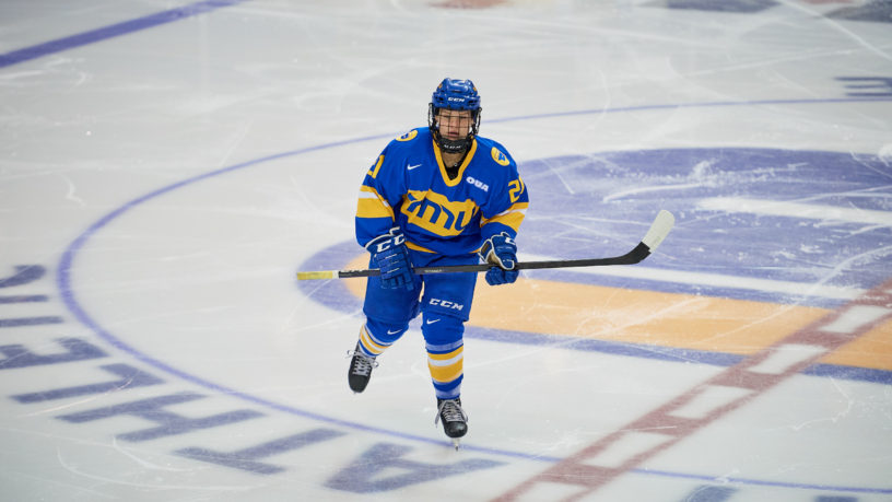 TMU Bold women's hockey captain Emily Baxter skates alone on the ice