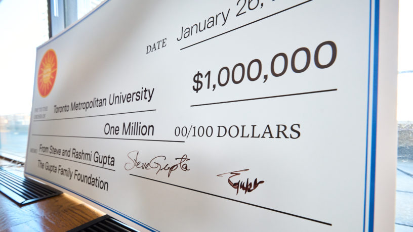 $1 million large cheque placed on windowsill upright.
