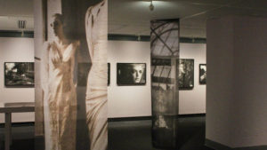 artistic photos hand on the wall at the "Other Worldly" exhibit at TMU's Image Arts building