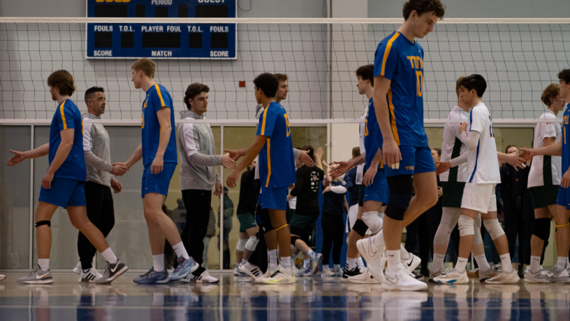 Members of the Bold men's volleyball team congratulate their opponent