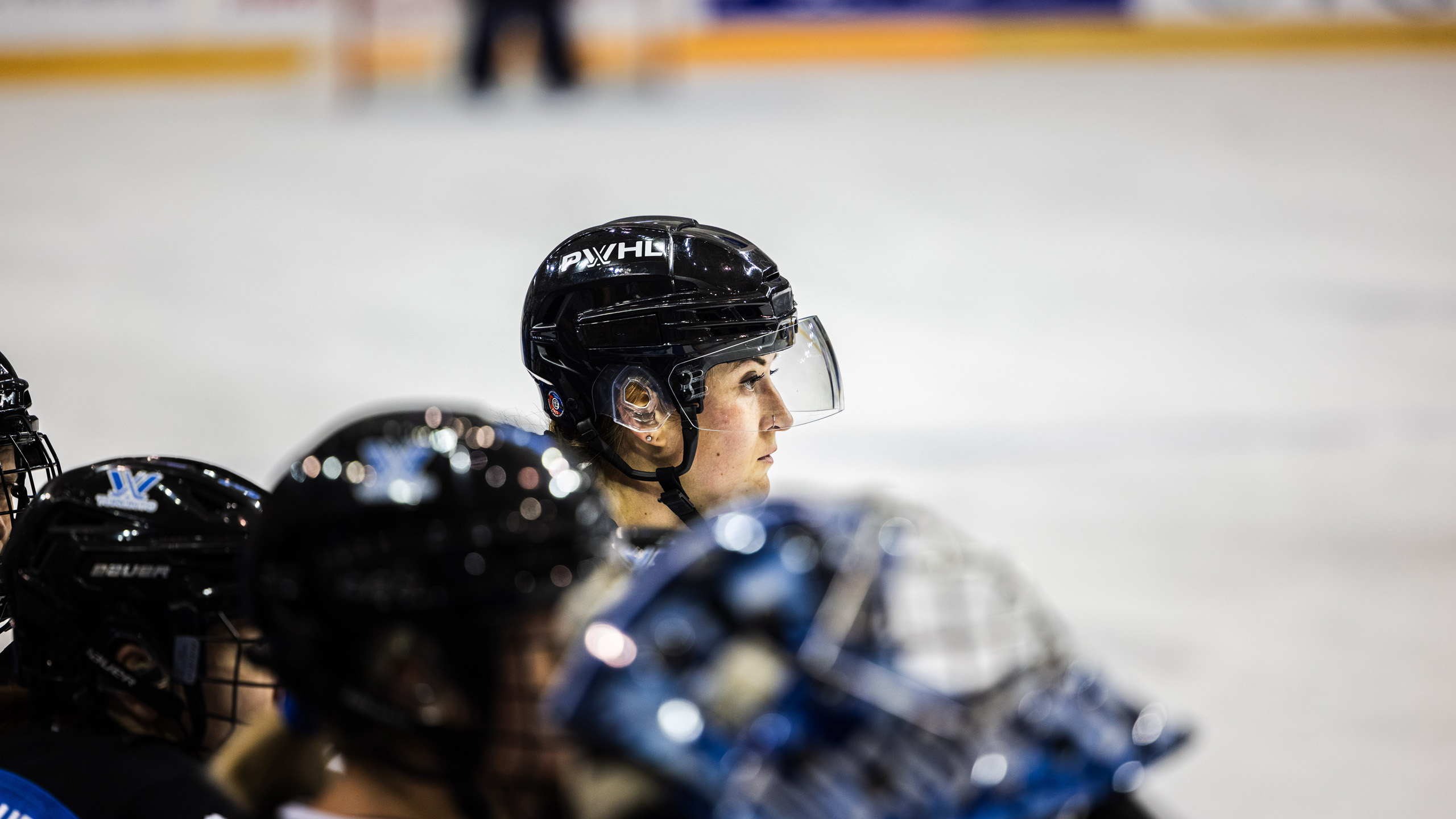PWHL Toronto player stares at the ice
