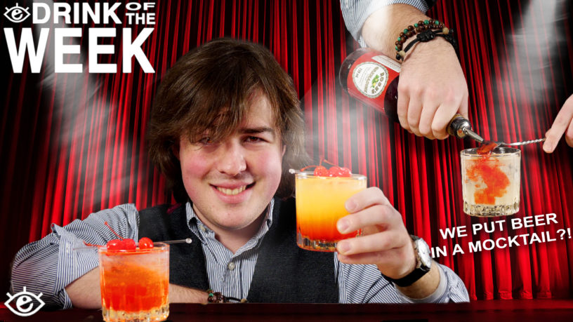 top left corner reads drink of the week, in the center is a man with long brown hair holding up an orange drink