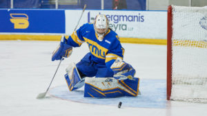 TMU women's hockey goaltender Alexia Stratos stops a puck