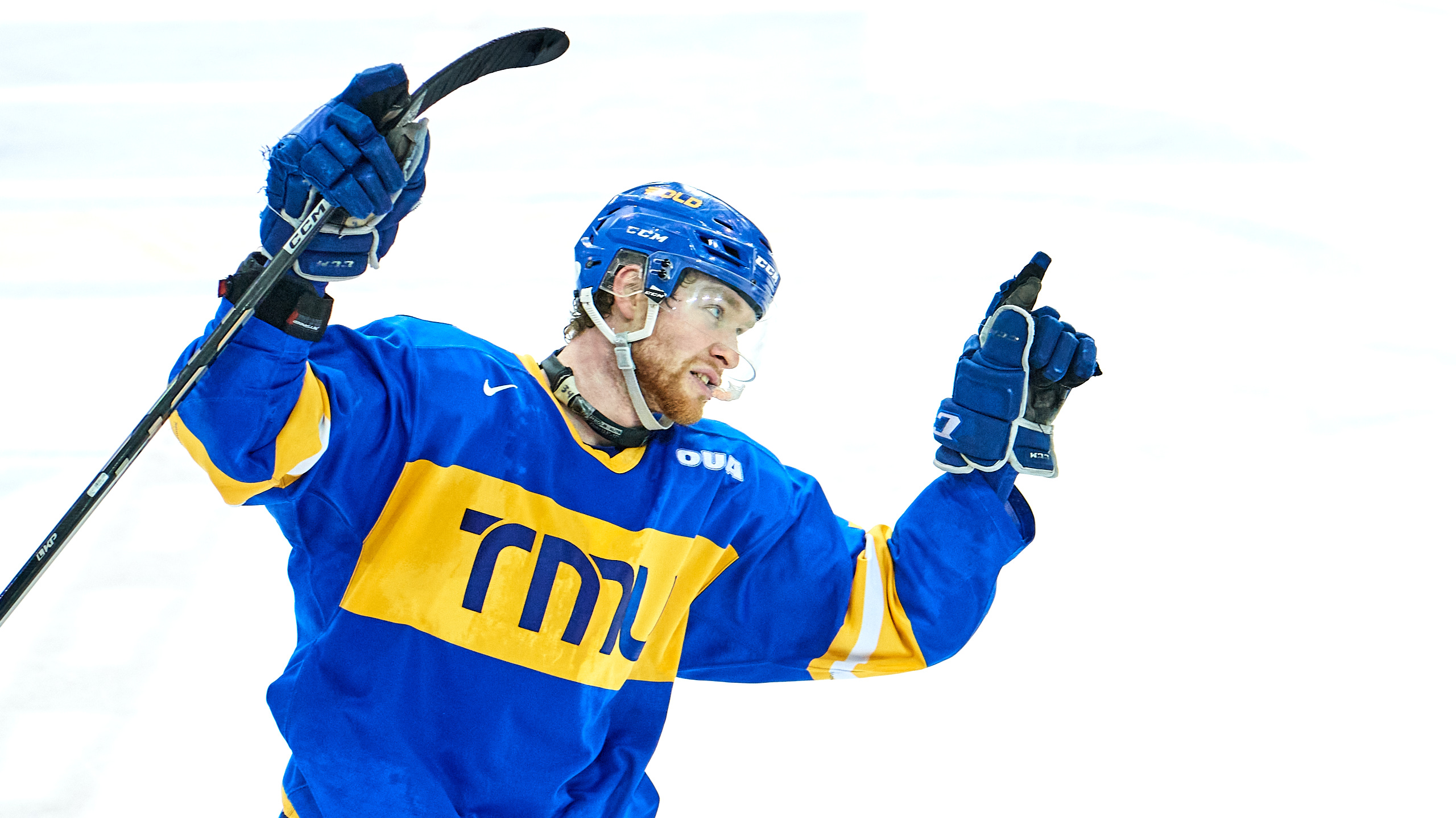 TMU Bold hockey player Connor Bowie celebrates