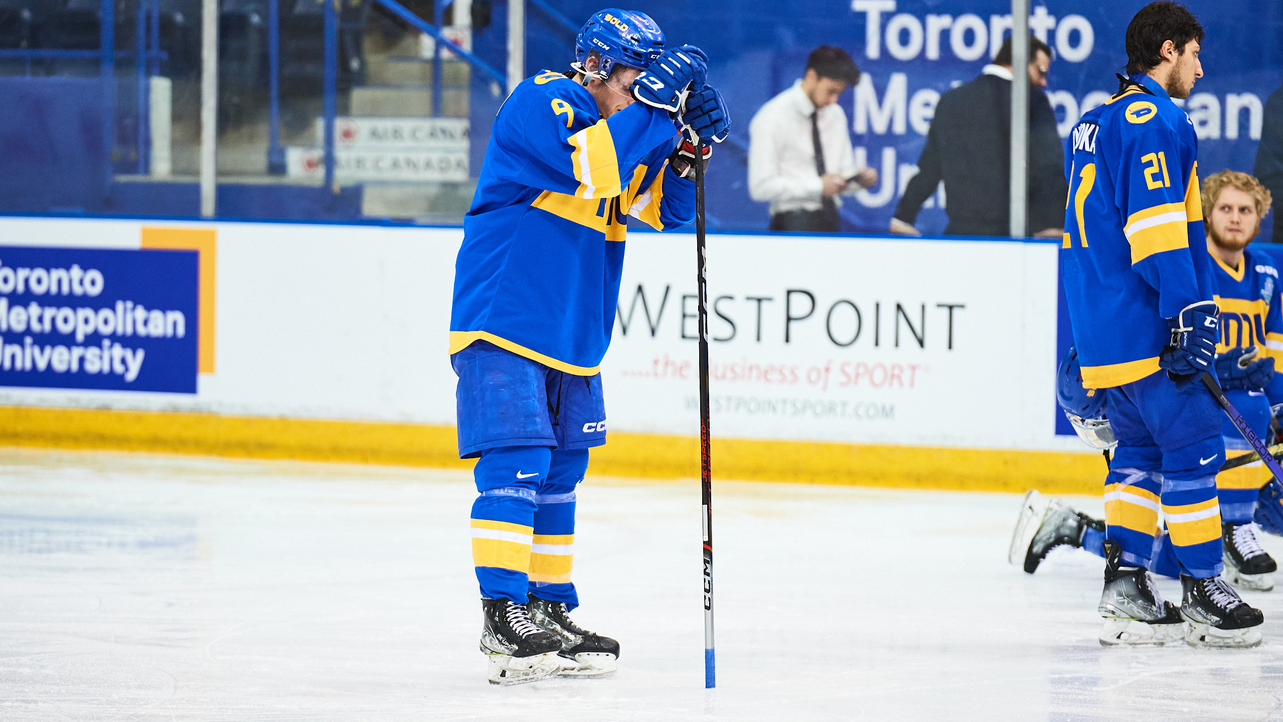 TMU forward Daniil Grigorev looks down at the ice as he stands near the blue line