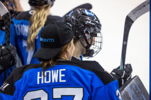 The back of a player in a blue jersey with the name Howe on it