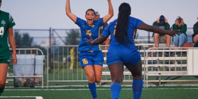 First-year defender Reilly Flesher celebrating after scoring her first goal for the TMU Bold women's soccer team