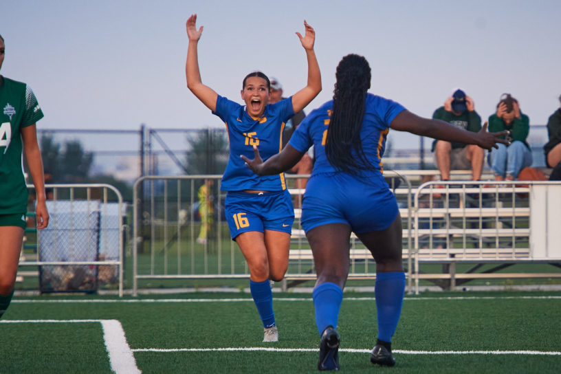 First-year defender Reilly Flesher celebrating after scoring her first goal for the TMU Bold women's soccer team