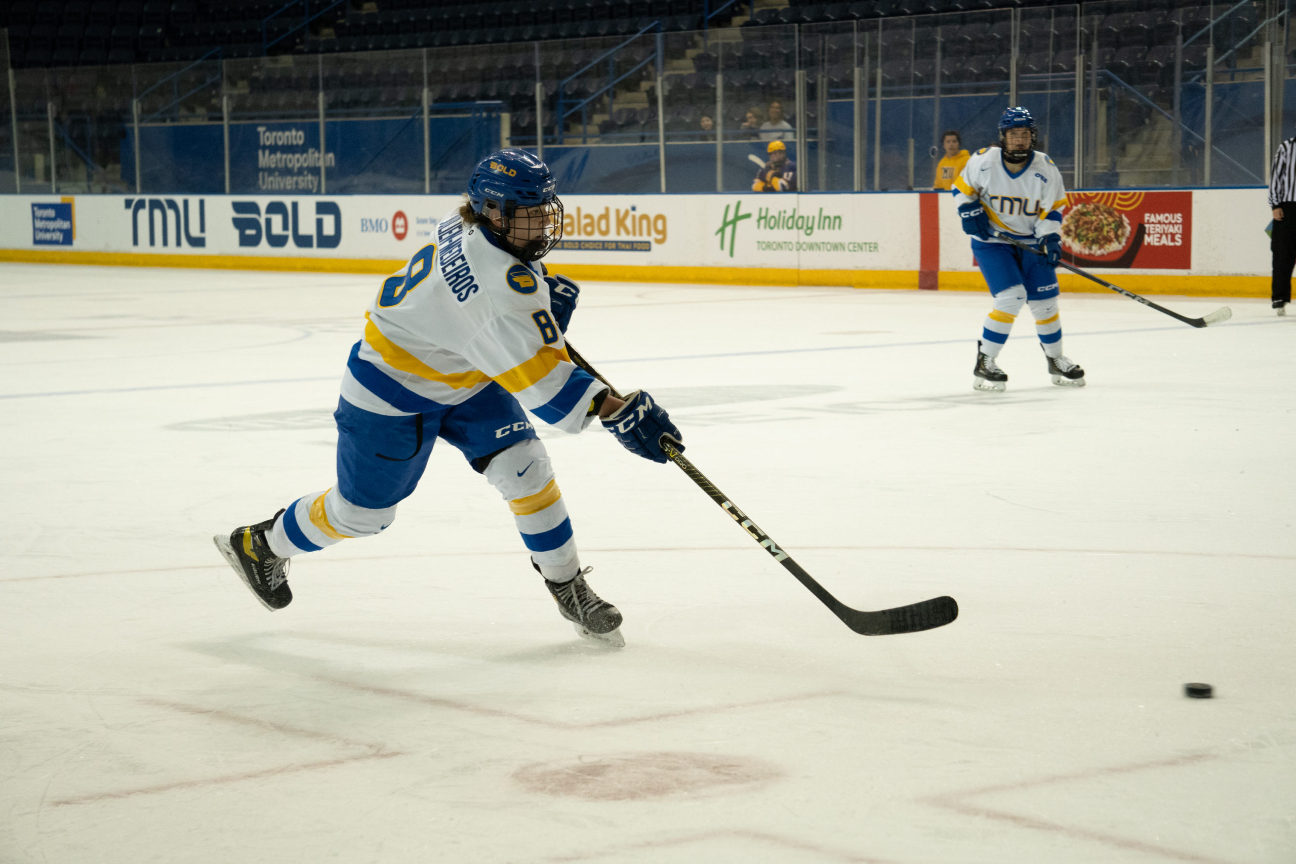 TMU Bold women's hockey player Ahalya Julien-Medeiros shoots a puck