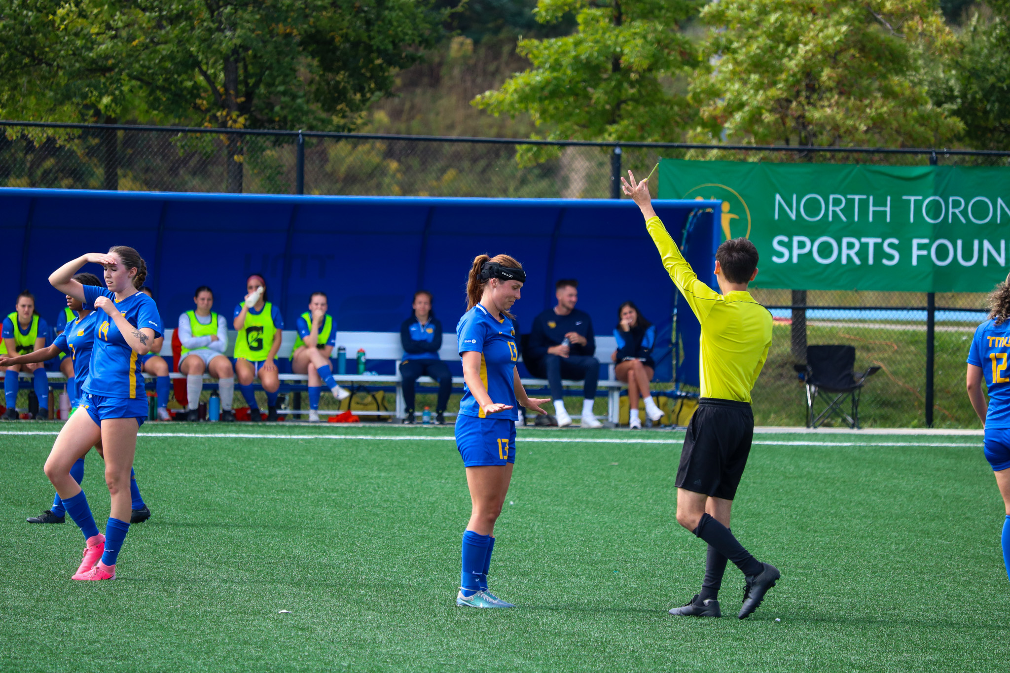 Emily Porteus getting a yellow card