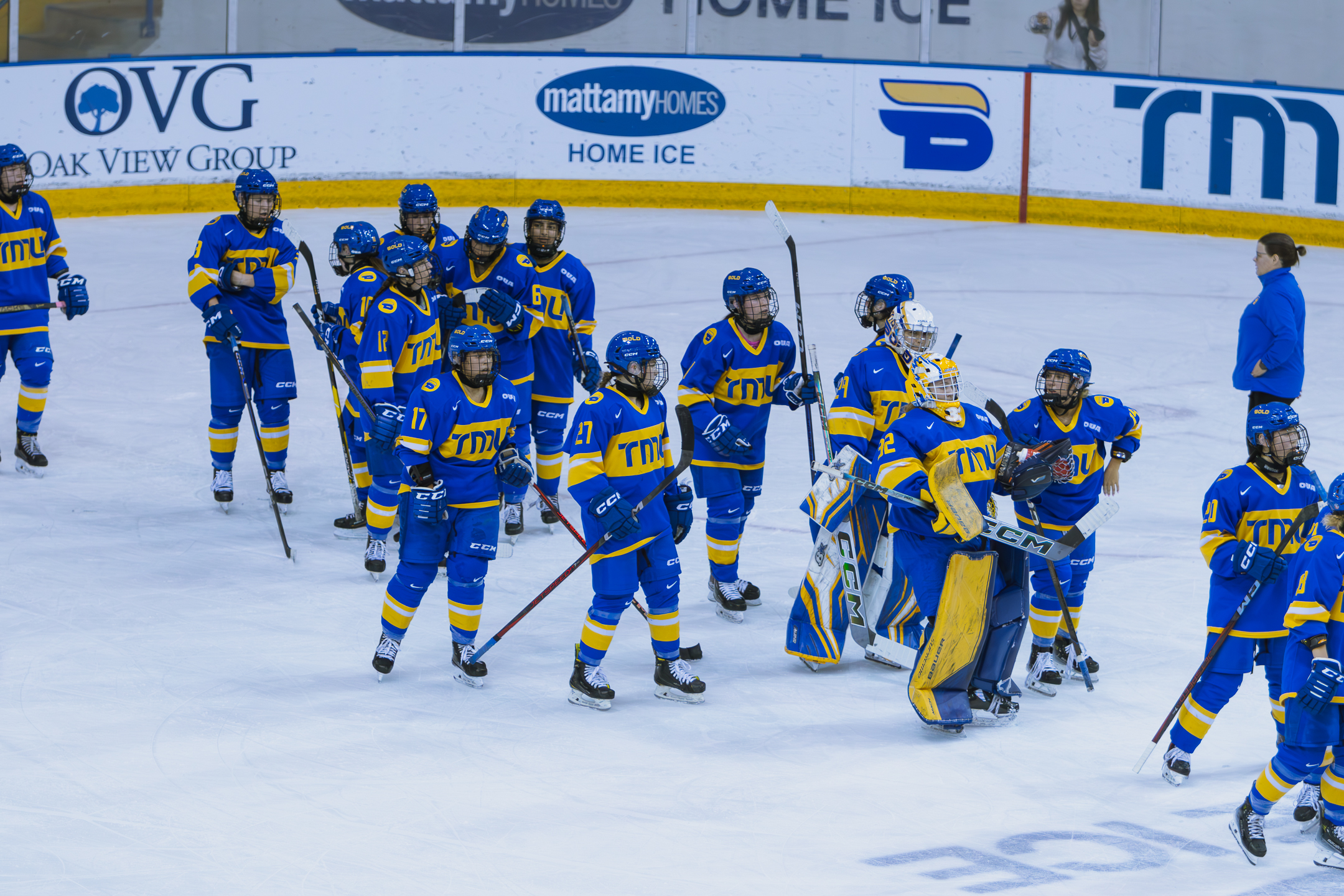 The TMU Bold's women's hockey team regrouping after the defeat against Western 