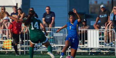 defender Taliyah Walker disputing the ball