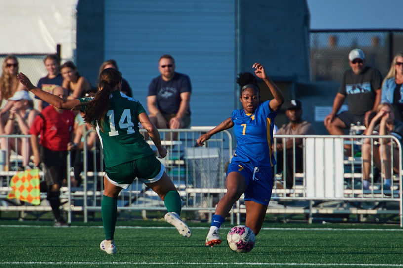 defender Taliyah Walker disputing the ball