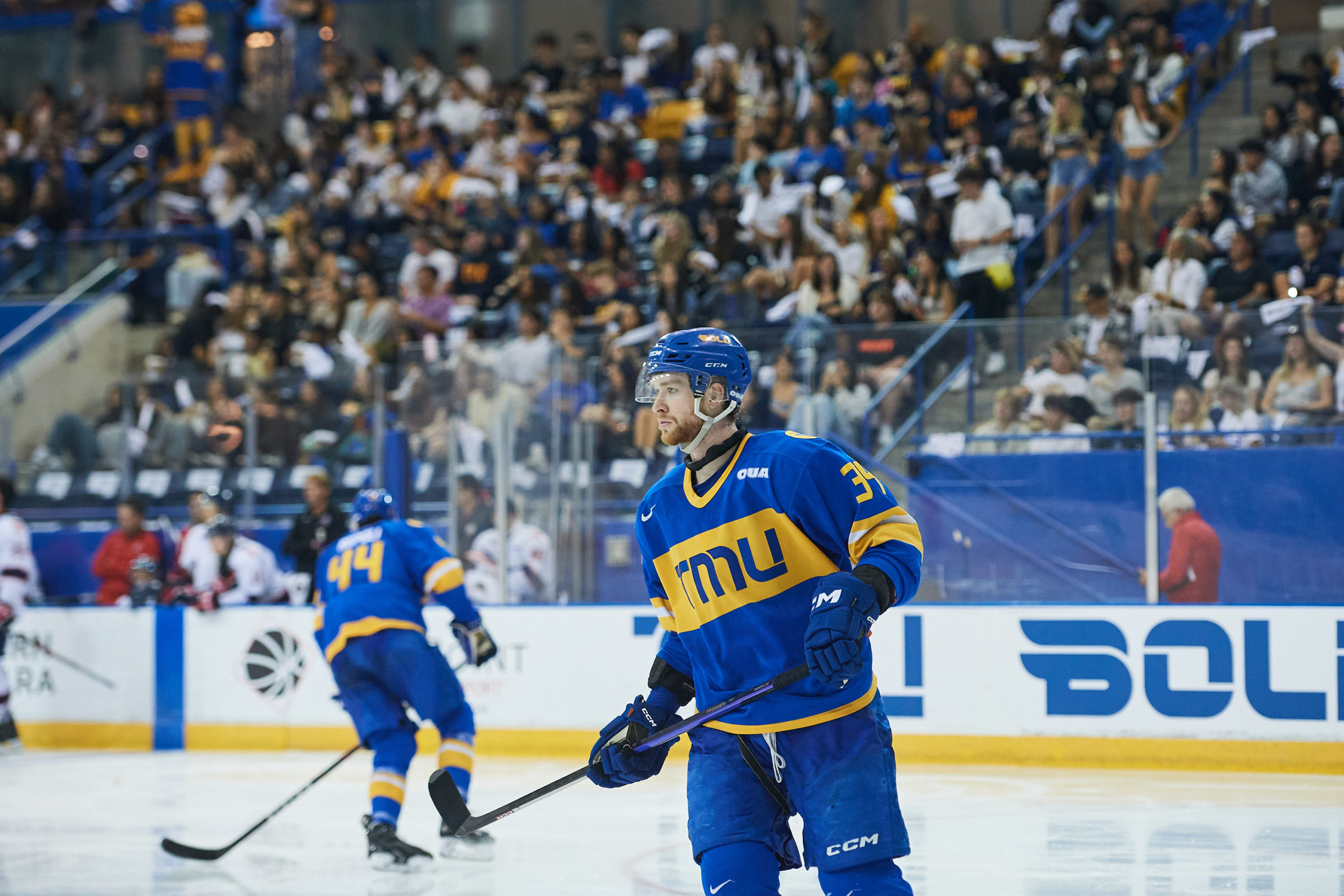 Connor Bowie skating at the MAC with a background of the stands completely full