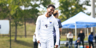 Jevontae Layne smiling after debuting for the TMU Bold men's soccer team