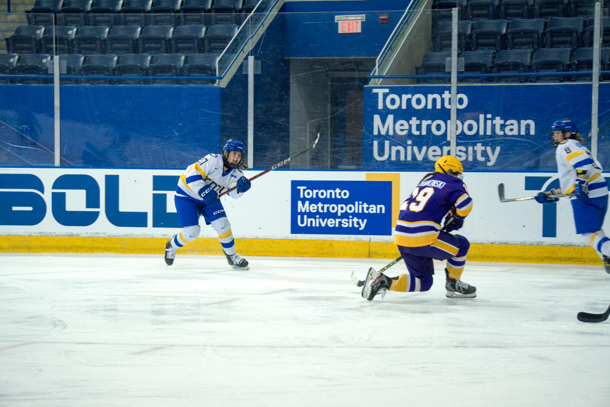 Dayle Chinnick shooting the puck against the Wilfrid Laurier Golden Hawks