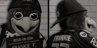 a black and white mugshot photo illustration of TMU mascot Frankie the Falcon