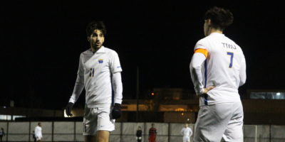 Justin Santos and Luca Di Marco speak during a game