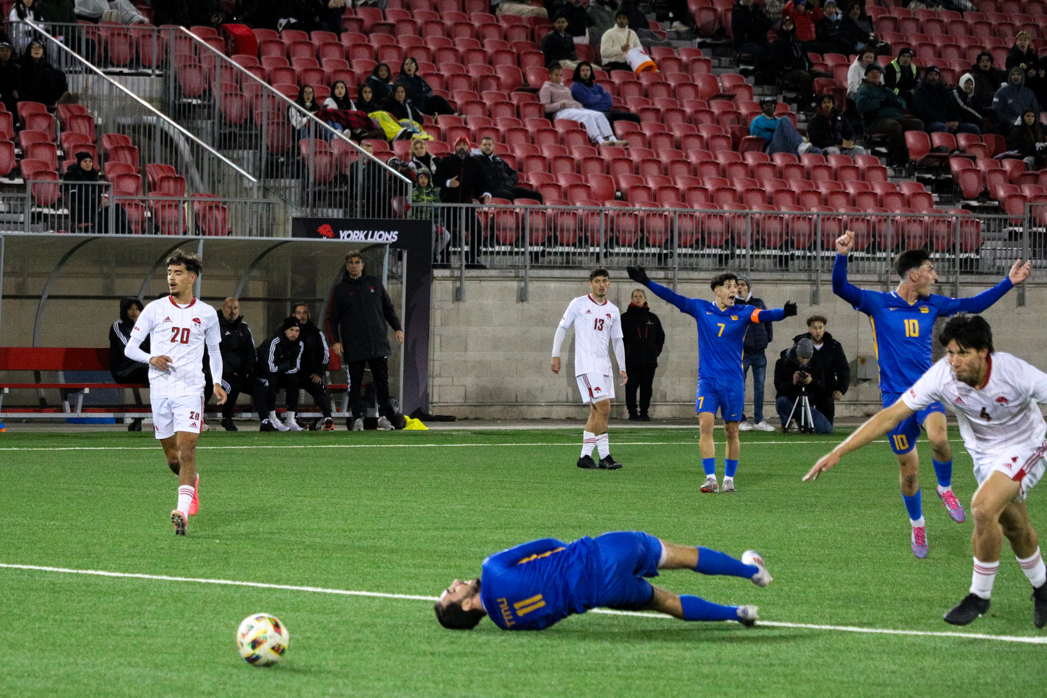 Justin Santos being fouled outside the area 