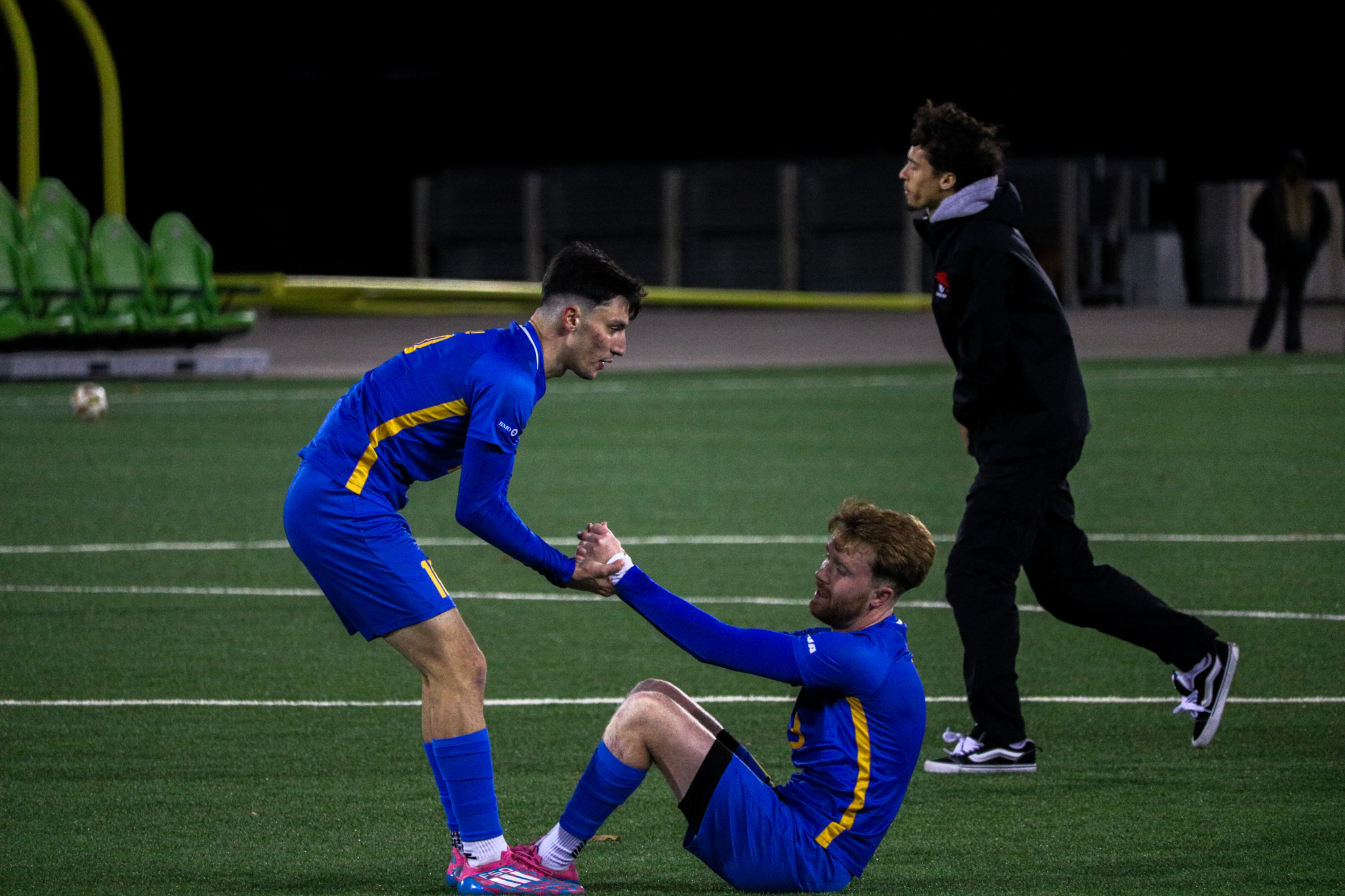 Chris Campoli lifting Colin Gander after the defeat