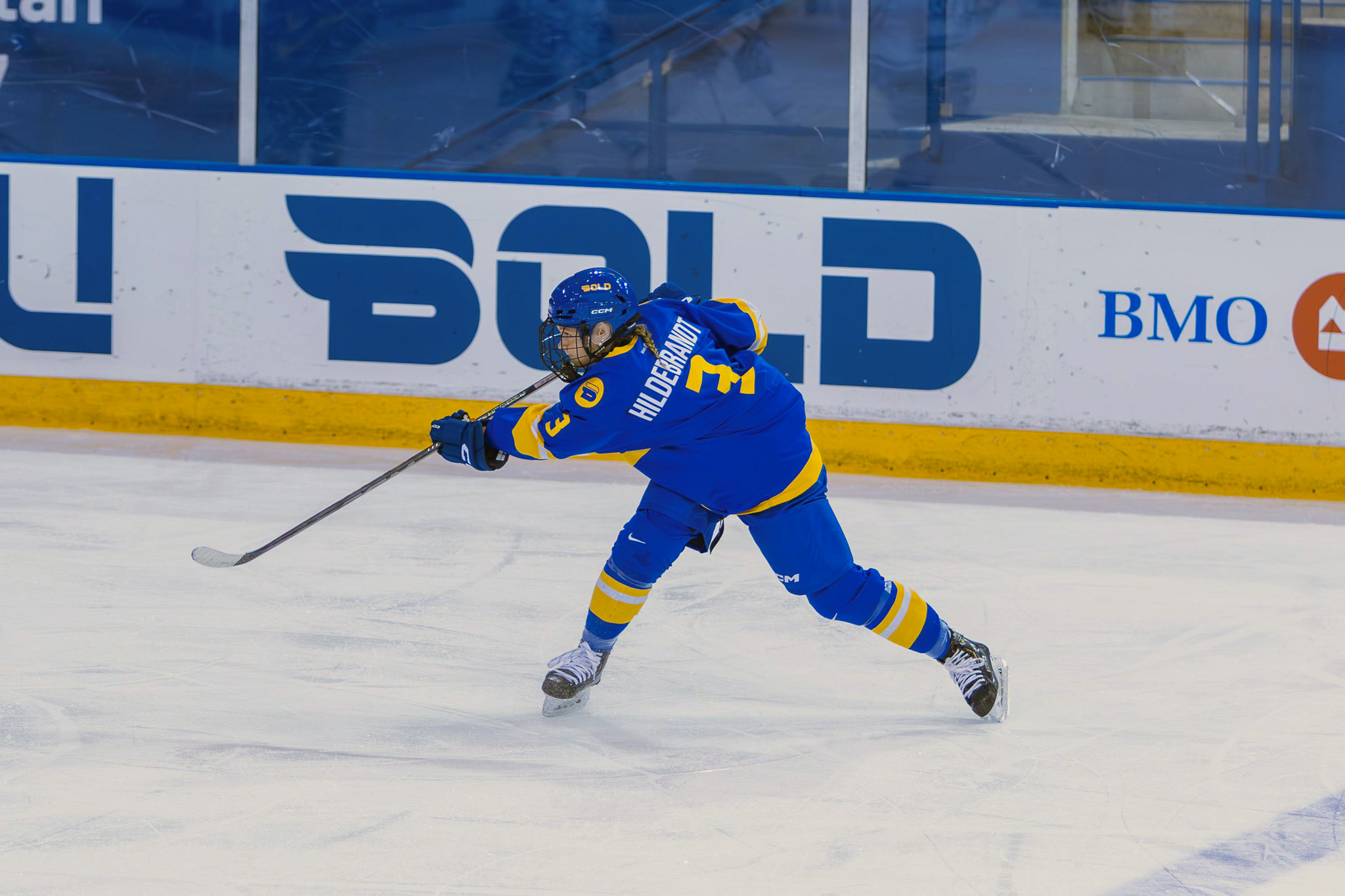 Taliya Hildebrandt shooting the puck in her first game for the Bold