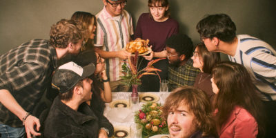 A group shot of the Eyeopener Masthead team enjoying a thanksgiving dinner.