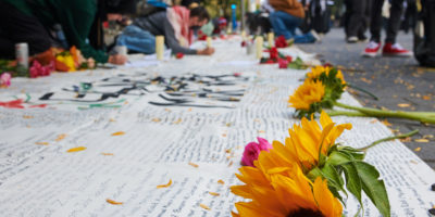 FLOWERS NEXT TO VIGIL