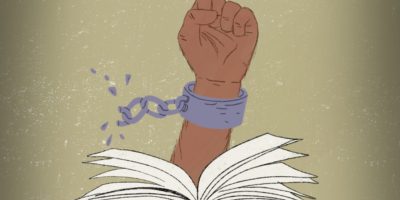 An illustration of an open book from which a brown-skinned fist emerges, breaking a chain attached to its wrist.