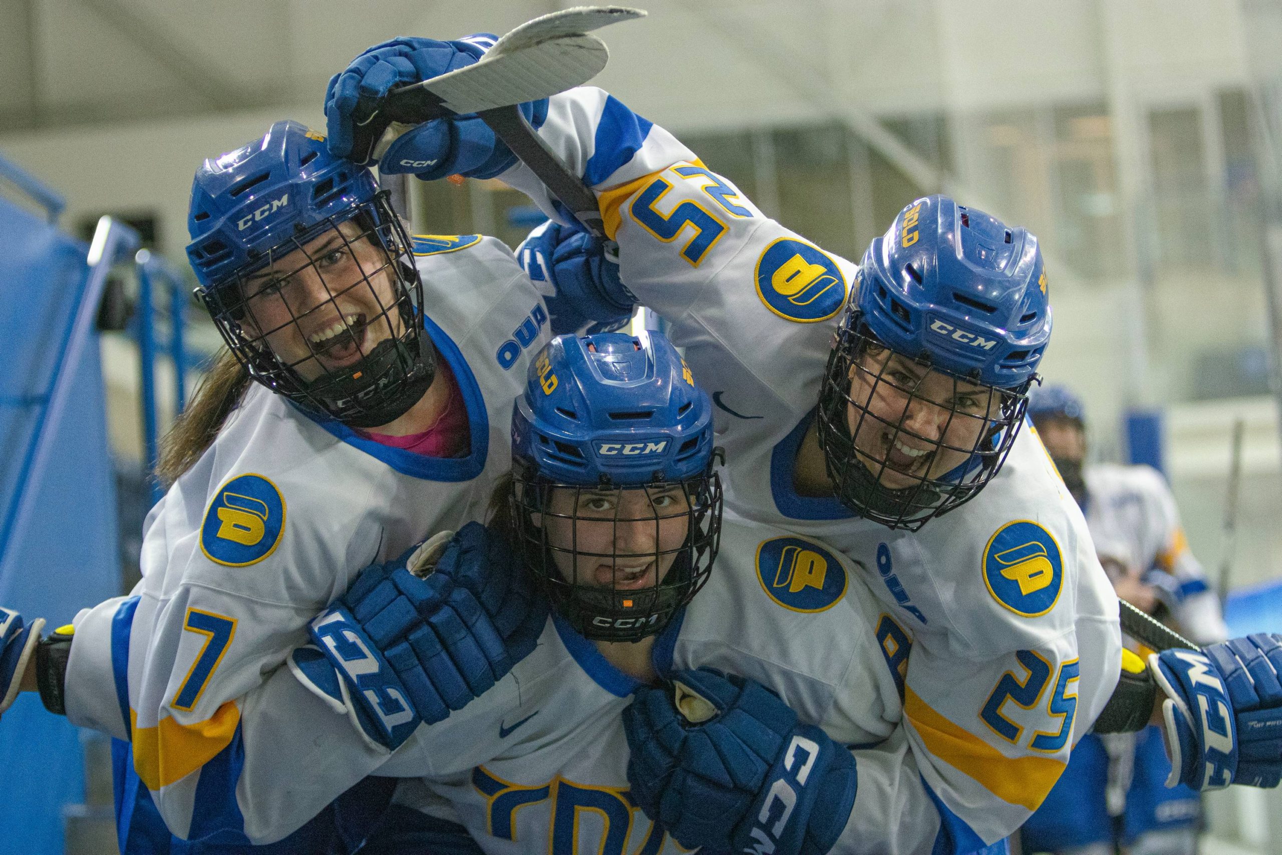 three TMU Bold players celebrating the win