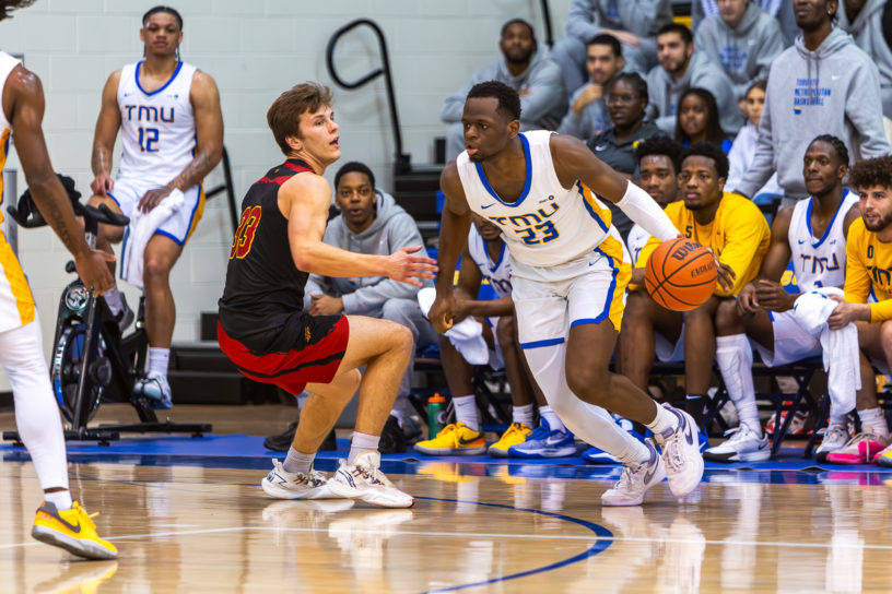 Michael Kayembe with the ball