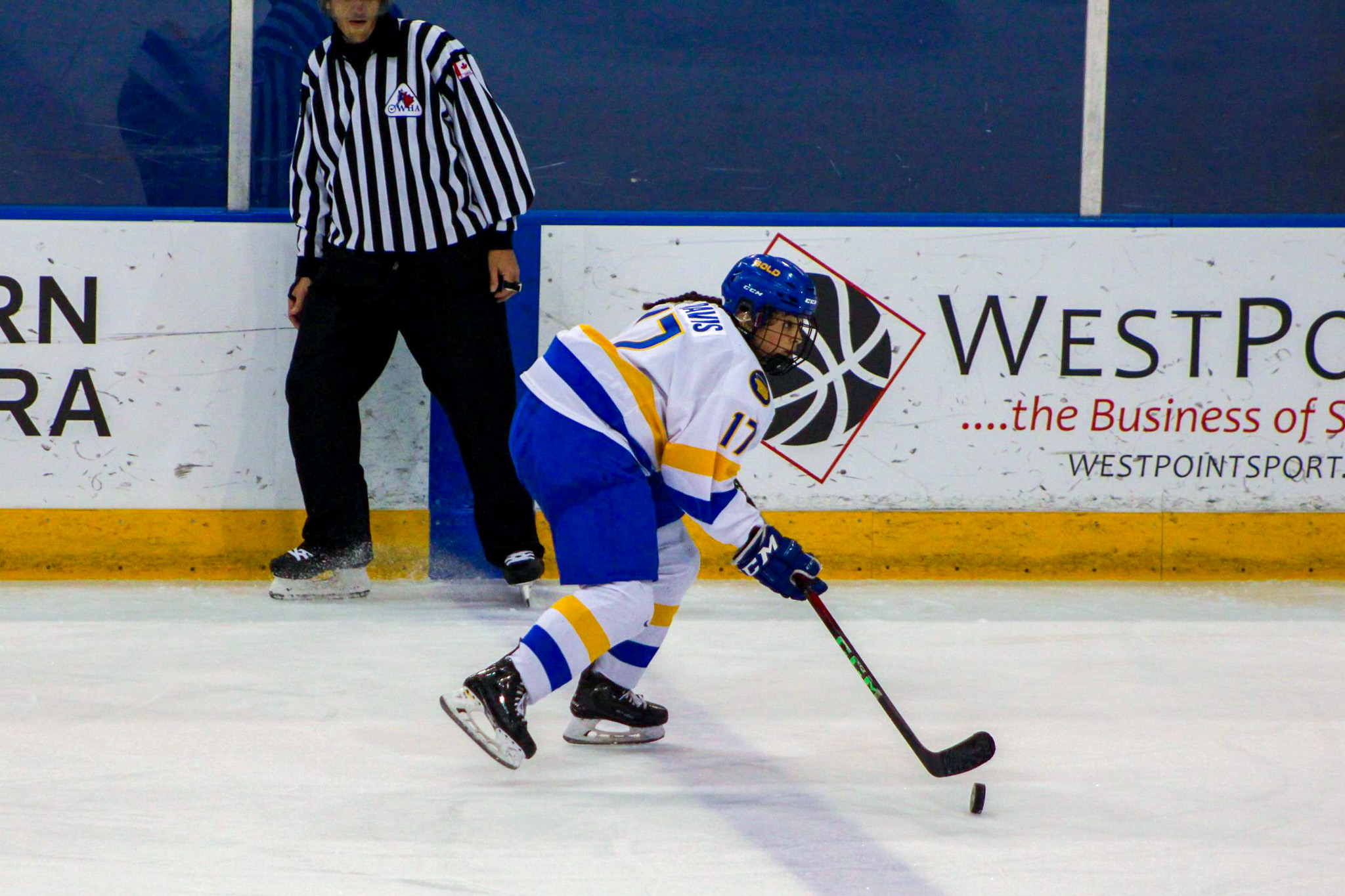 Cailey Davis driving the puck down the wing