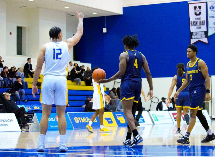 Aaron Rhooms, giving a thumbs up to the bench in game where he scored 26 points