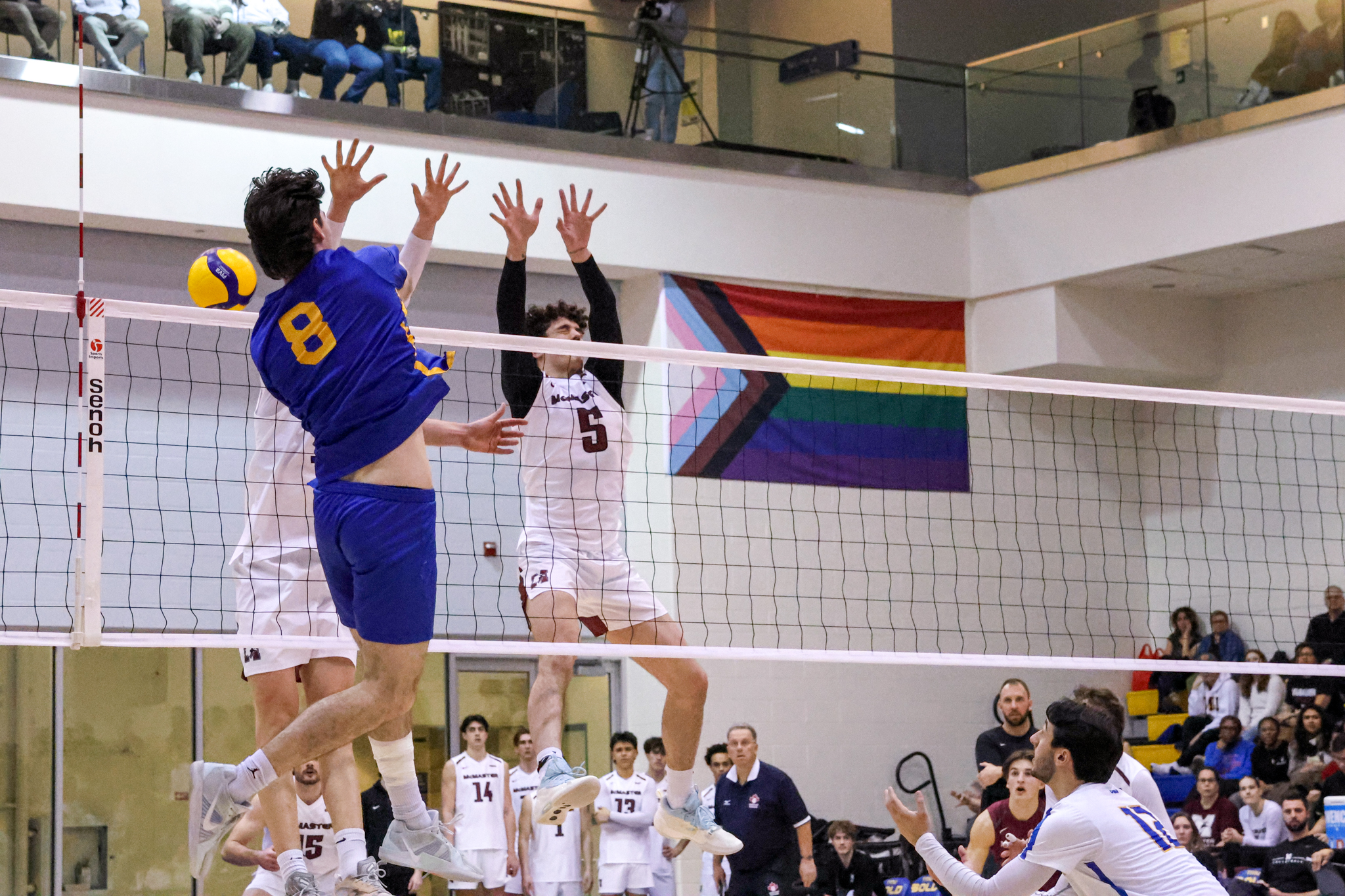 Riley Donovan hitting the ball from the left hand side of the court